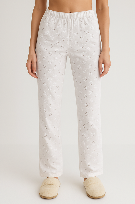 Women’s white wide-leg trousers with embroidered detailing and elastic waistband—loose fit for casual and chic looks.